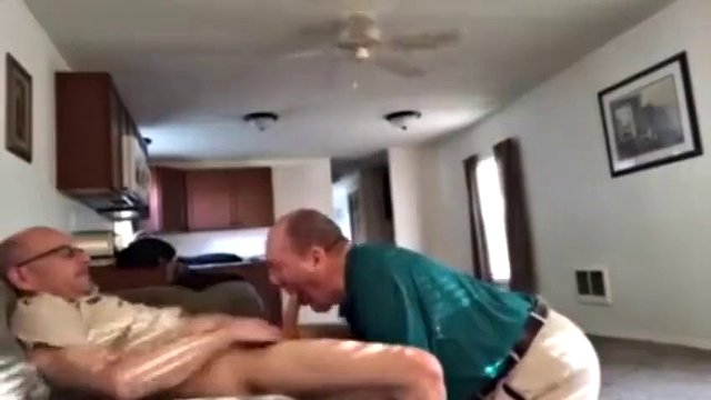 Clothed grandpa on his knees sucking daddy's cock