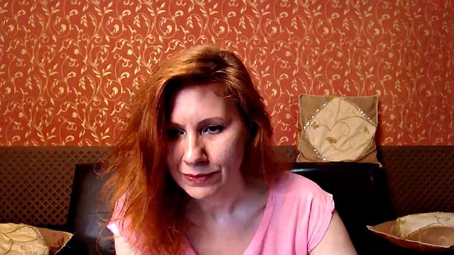 Redhead mature webcam shows her hairy pussy