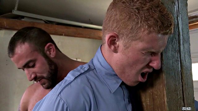 Naughty prison guard gets anal drilled by a muscular bear with a huge cock