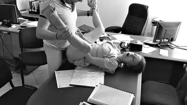 The boss fucks his tiny secretary on the office table and records it with a hidden camera