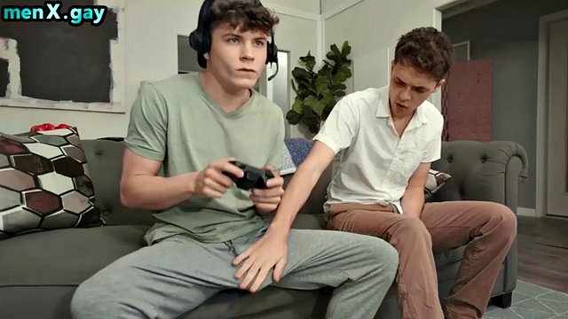 Skinny twink fucked bareback at home on the couch by the gamer's boyfriend