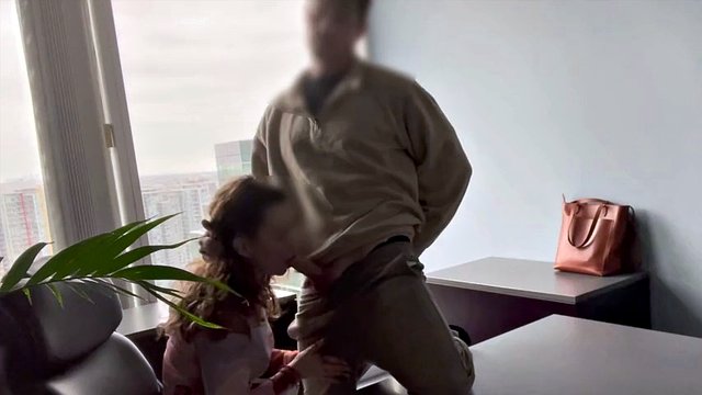 MILF boss fucked at her office window
