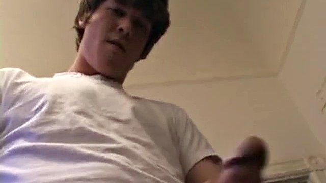 Matthew Matters wants to jerk off so he unzips his jeans and sticks out that monster cock. He strokes himself for a while before asking for help and in the blink of an eye pumps a messy load onto his stomach and licks it off.