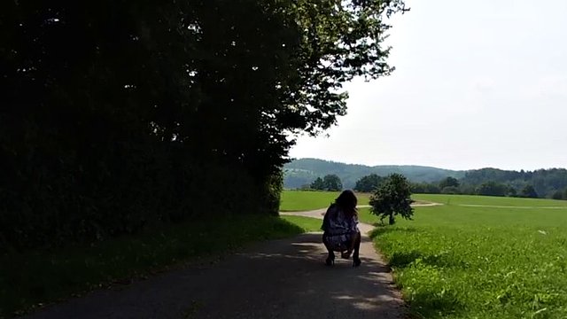Cross dressing gay slut toys his anus neat the forest