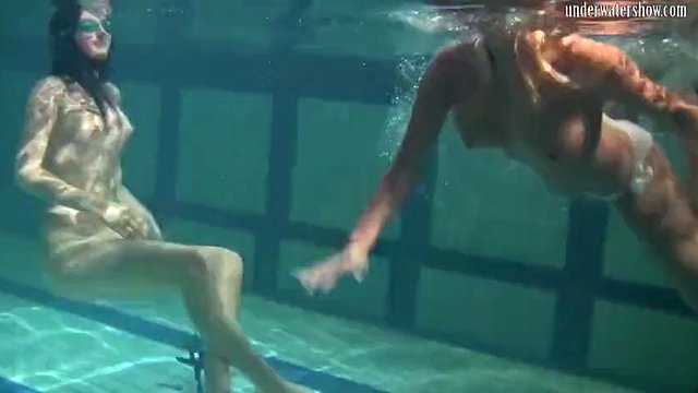 Hot girls Irina and Anna swim naked in the pool