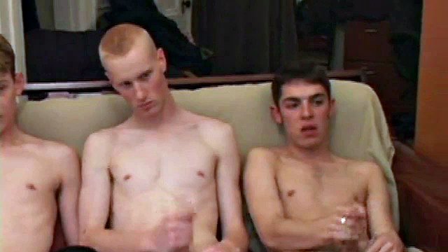Richard, Skylerr and Kaos light up some porn and grab their crotches, before getting naked. After squirting the lube, the horny young guys fondle each other, then Kaos goes down on Skylerr's cock for a while.