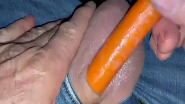Small inverted cock gets fucked by a carrot
