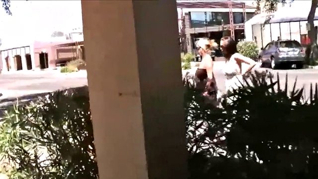 sexy blonde and burnette out in public showing off all they can without getting caught