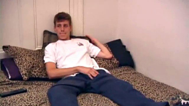 Straight boy Skylerr is horny and wants to fight back under a porn video. He works through his pants and then pulls out his huge cock.