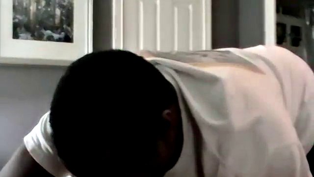 Two horny studs sucking shafts in an interracial porn video