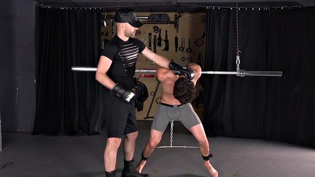 Crucified muscle stud BDSM Gay bondage Spanking Gut punch