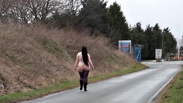 Ugly fat slut walking naked on a public road