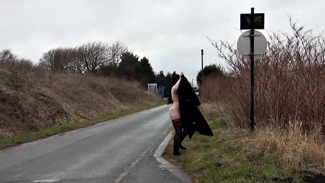 Ugly fat slut walking naked on a public road