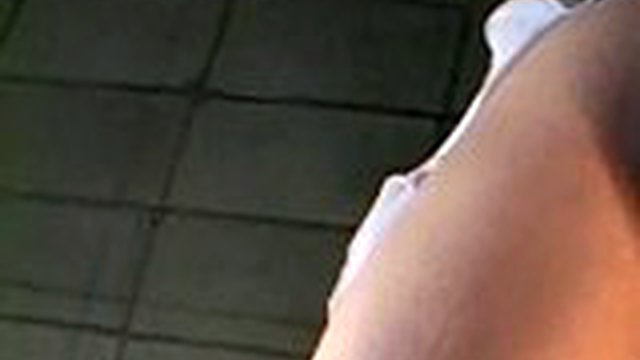 Asian milf stuffs her pussy with a dildo
