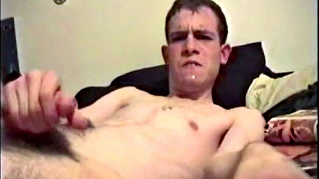 Putting his hairy ass and balls in our face, Nate gets a hard-on, with a little help from some porn magazines. The young man kneels on top of his porn, and a box, with a pillow tucked between his legs.