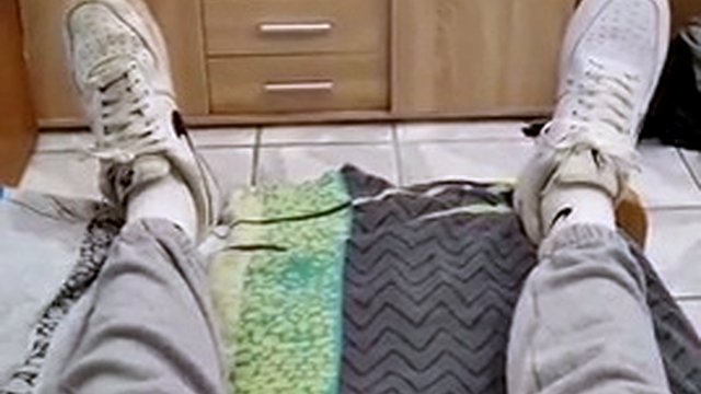 Fucking in sneakers in bed