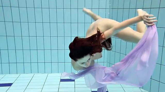 Dark haired Aneta in the pool