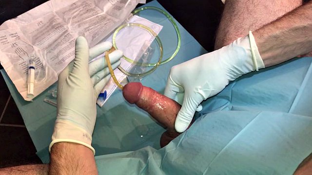 The first painful insertion of a catheter with cumshot into the urethra