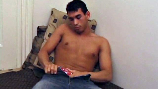 The strong and silent guy, Justin Christopher, doesn't have much to say, and lets his naked body speak for itself. He masturbates with increasing arousal as he cups his testicles until he pumps a load of hot and salty cum into his stomach.